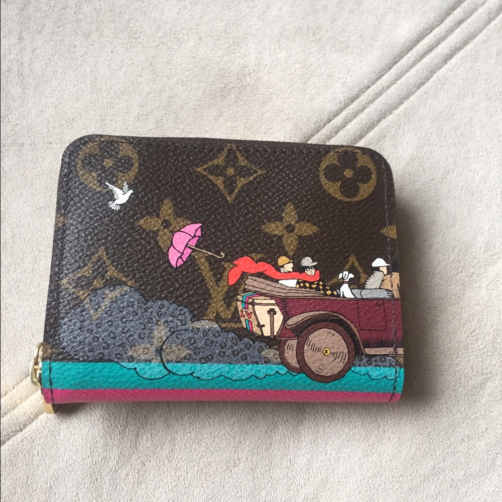 LE Louis Vuitton Evasion Zippy Coin Purse